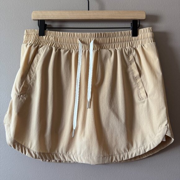 Women's L Halara High Waisted Drawstring Pocket Curved Hem Mini Golf Skirt - Picture 4 of 8